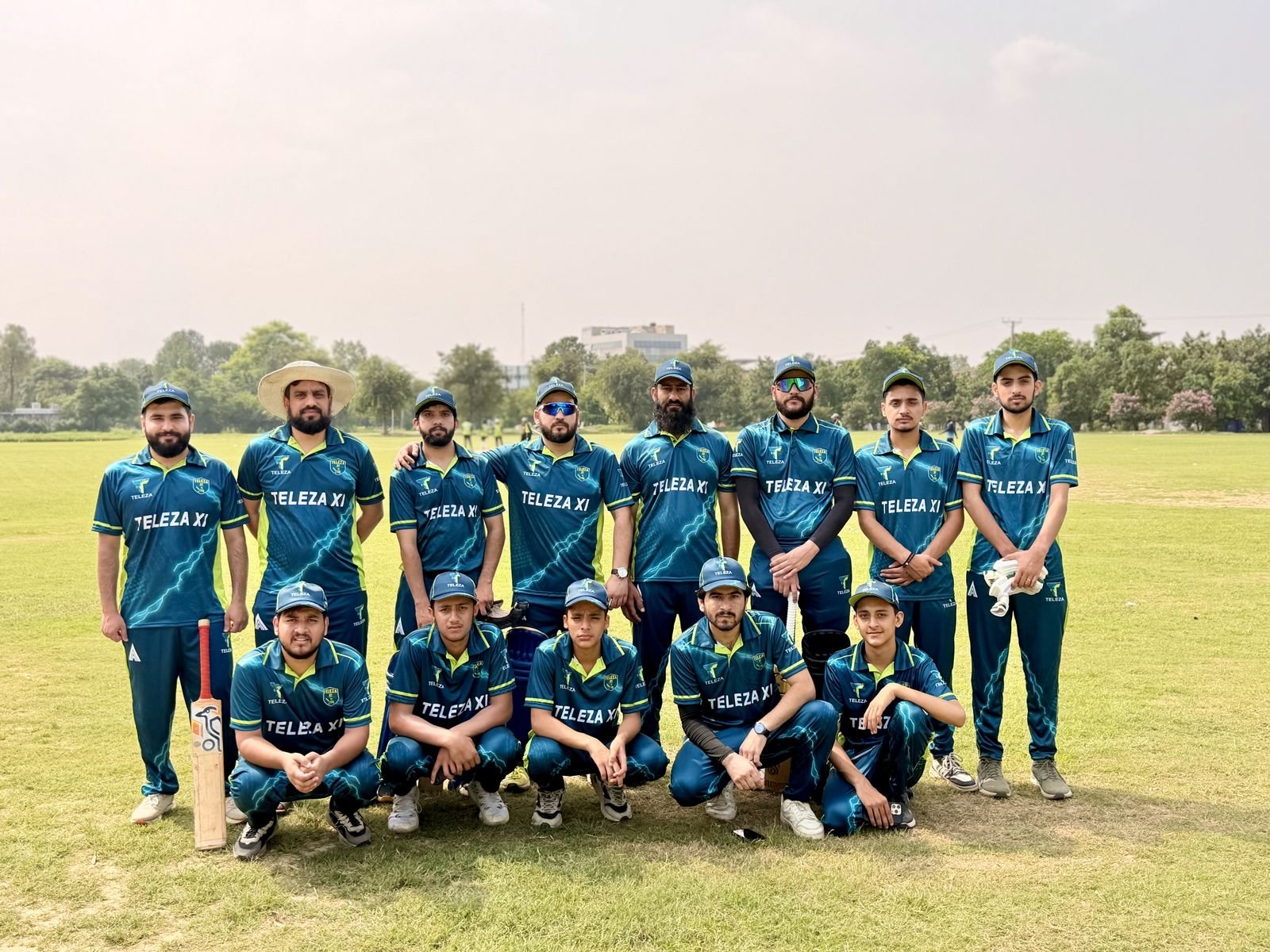 Teleza XI, the Teleza Marketing cricket team, in team kit on the field